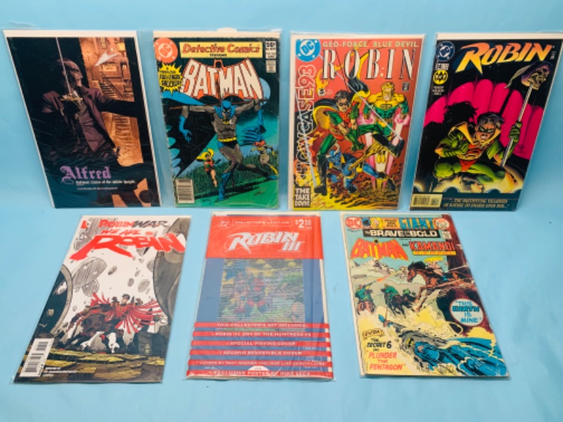 Photo 1 of 278206… seven Batman and robin comics in plastic sleeves