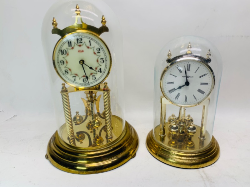 Photo 1 of 278267…two vintage mantle clocks- one brass and glass and one plastic  and glass