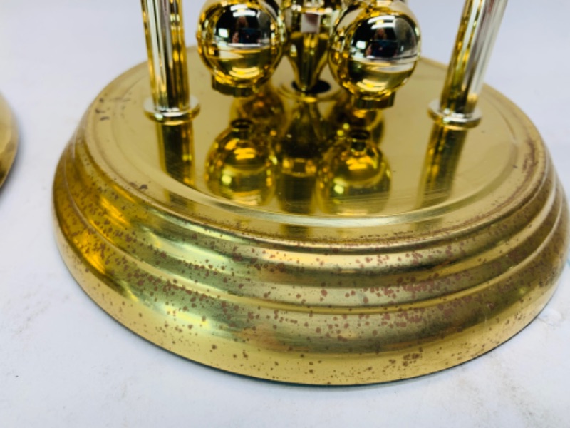 Photo 1 of 278267…two vintage mantle clocks- one brass and glass and one plastic  and glass