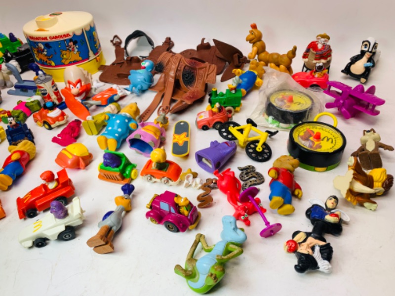 Photo 1 of 278277…vintage toys, happy meal, wind up, and others. Dreamtime carousel needs disc- not complete 