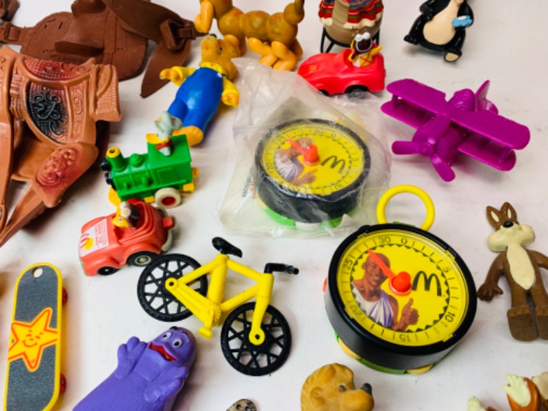 Photo 5 of 278277…vintage toys, happy meal, wind up, and others. Dreamtime carousel needs disc- not complete 