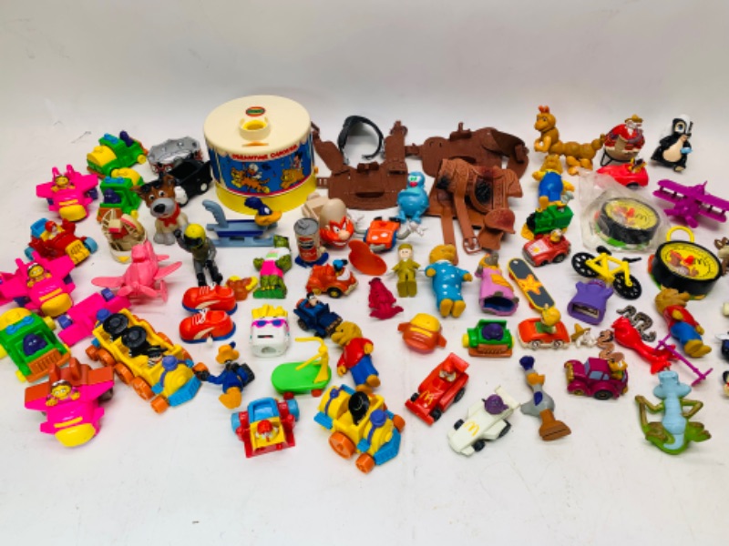 Photo 1 of 278277…vintage toys, happy meal, wind up, and others. Dreamtime carousel needs disc- not complete 