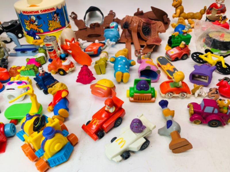 Photo 7 of 278277…vintage toys, happy meal, wind up, and others. Dreamtime carousel needs disc- not complete 