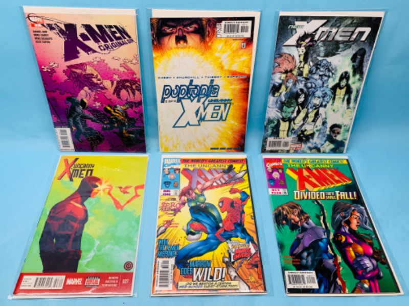 Photo 1 of 278302…6  X-men comics in plastic sleeves 