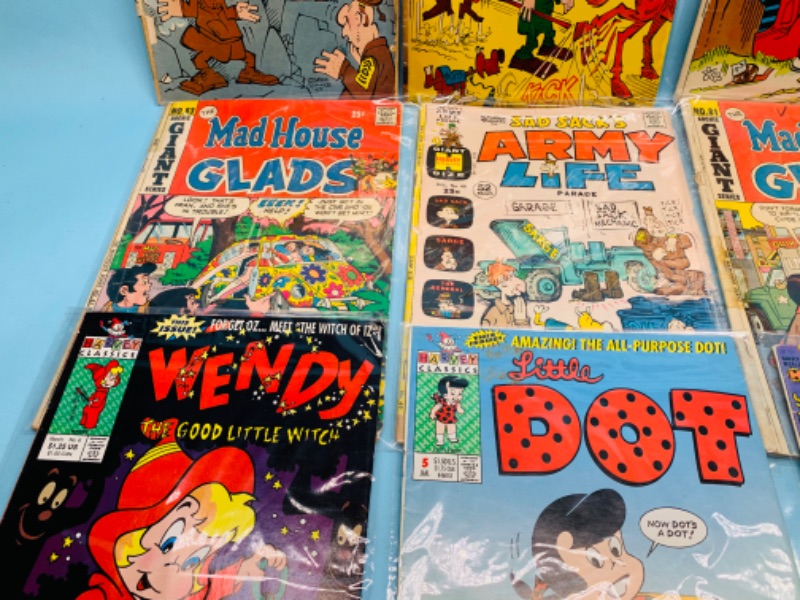 Photo 3 of 278318…12 vintage comics in sleeves- show wear from age 