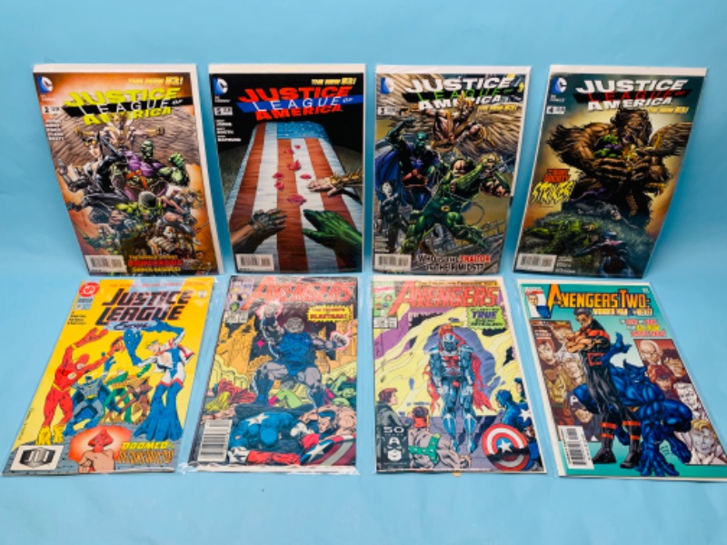 Photo 1 of 278320…avengers and justice league comics in plastic sleeves 