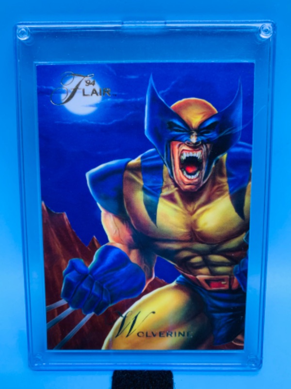 Photo 1 of 278335…flair 1994 Wolverine X-Men blue card in hard plastic case