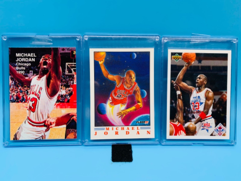 Photo 1 of 278338…3 Michael Jordan trading cards and hard plastic cases