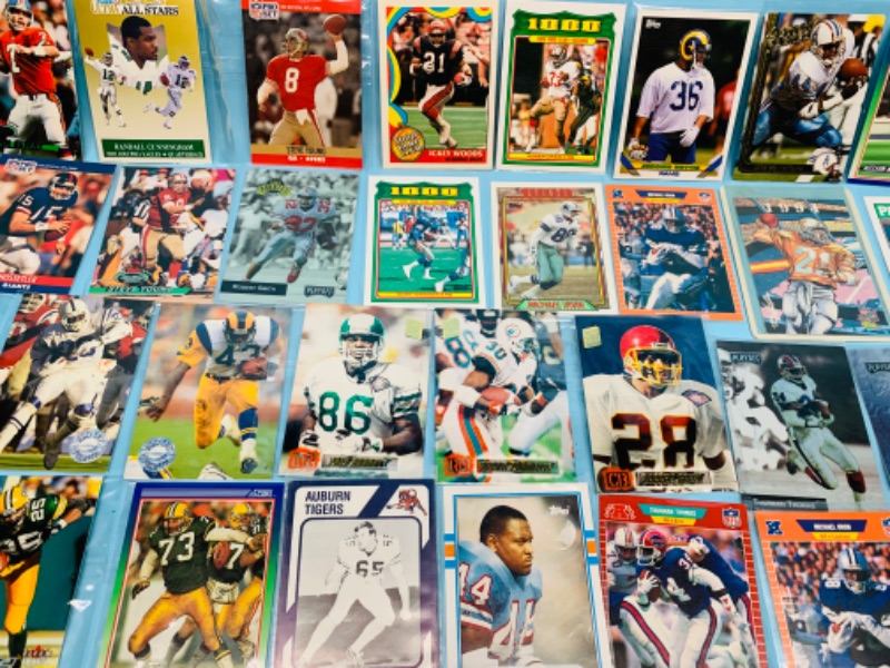 Photo 7 of 278350…60 nfl football trading cards in plastic sleeves 