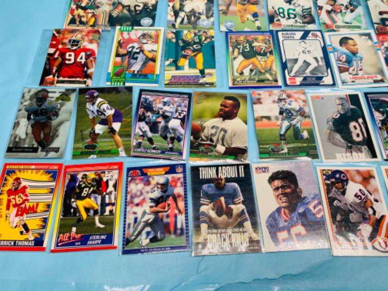 Photo 3 of 278350…60 nfl football trading cards in plastic sleeves 