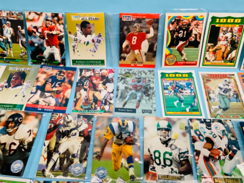 Photo 8 of 278350…60 nfl football trading cards in plastic sleeves 