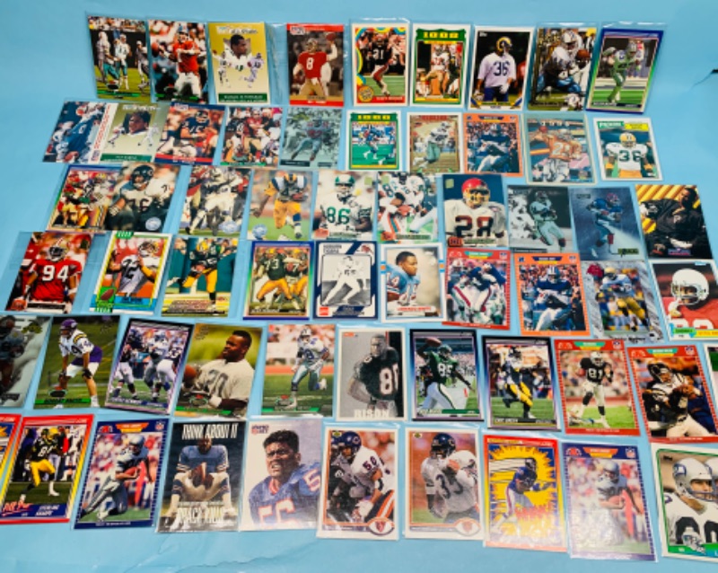 Photo 1 of 278350…60 nfl football trading cards in plastic sleeves 