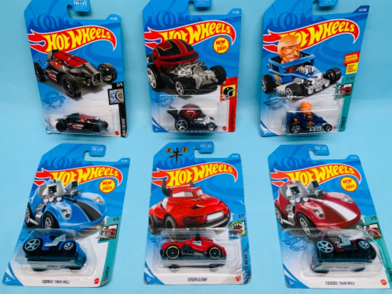 Photo 1 of 278394…6 hot wheels die cast racers in original packages 