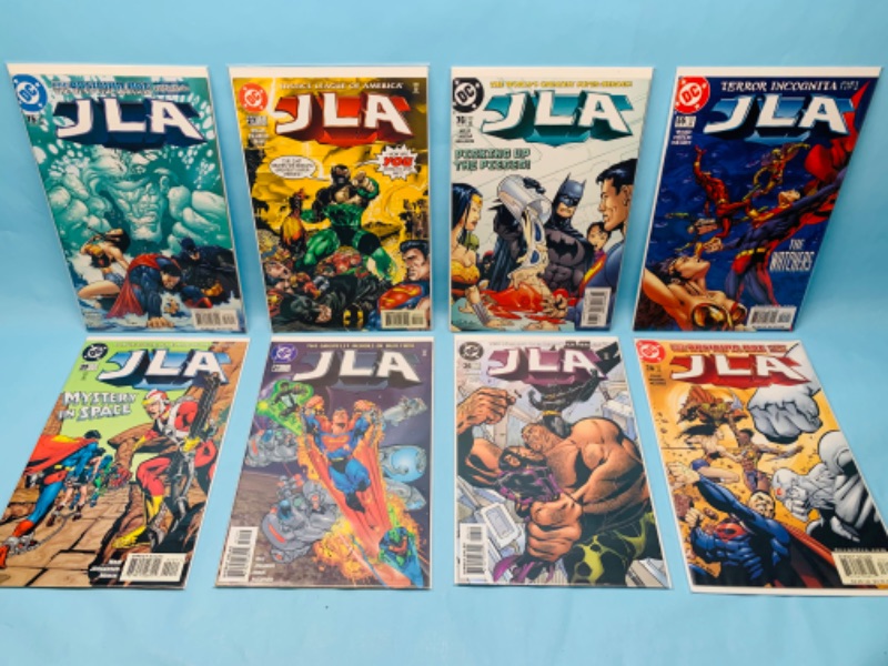 Photo 1 of 278427…8 JLA comics in plastic sleeves