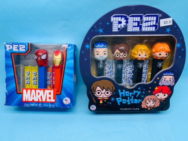 Photo 1 of 278609…marvel and Harry Potter pez in packages 
