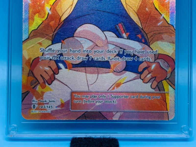 Photo 3 of 278638…Pokémon trainer Hala foil card 143/145 in hard plastic case 