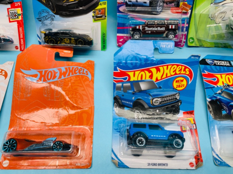 Photo 2 of 278655…9 hot wheels die cast cars in original packages- all packages have minor damage 