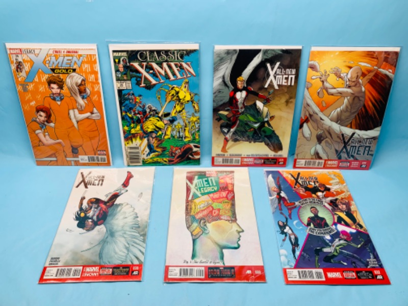 Photo 1 of 278666…7 X-men comics in plastic sleeves 