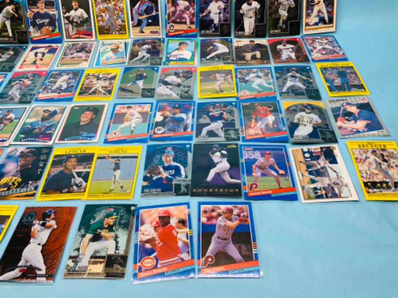 Photo 3 of 278676…60 mixed baseball trading cards in plastic sleeves 