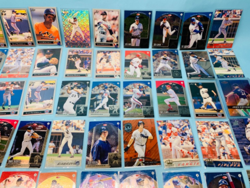 Photo 4 of 278677…60 mixed baseball trading cards in plastic sleeves 