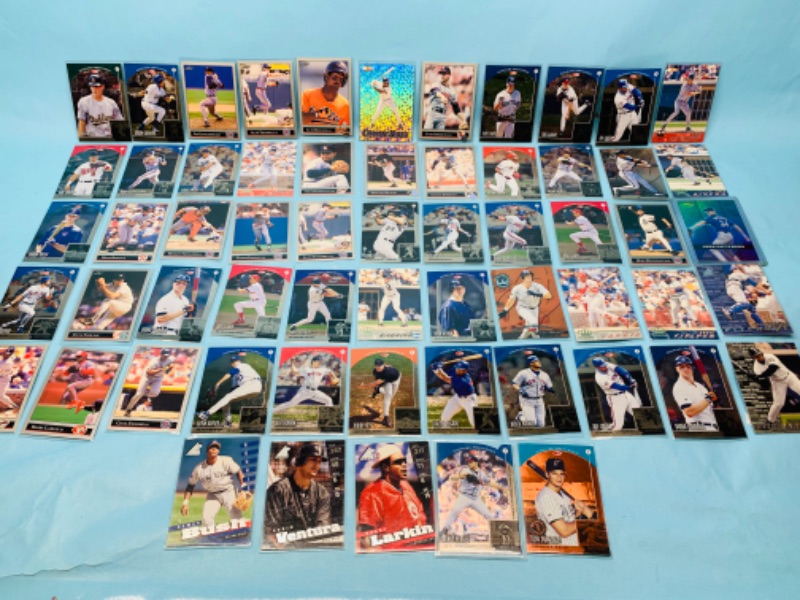 Photo 1 of 278677…60 mixed baseball trading cards in plastic sleeves 