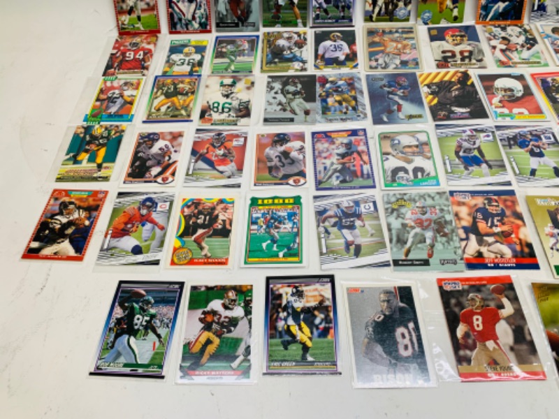 Photo 2 of 278694…60 nfl football trading cards in plastic sleeves 