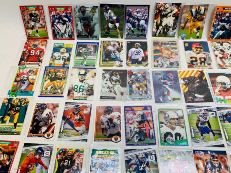 Photo 4 of 278694…60 nfl football trading cards in plastic sleeves 