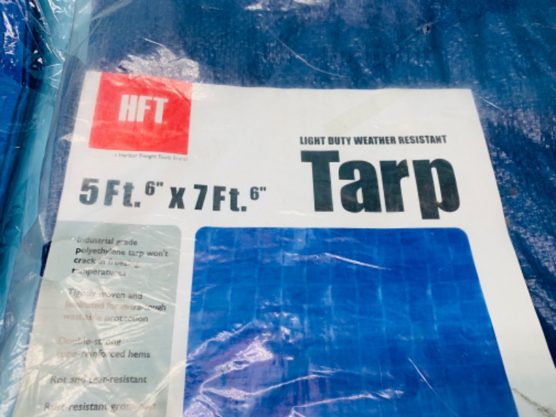 Photo 3 of 278701…two 5 x 7 foot tarps in packages 