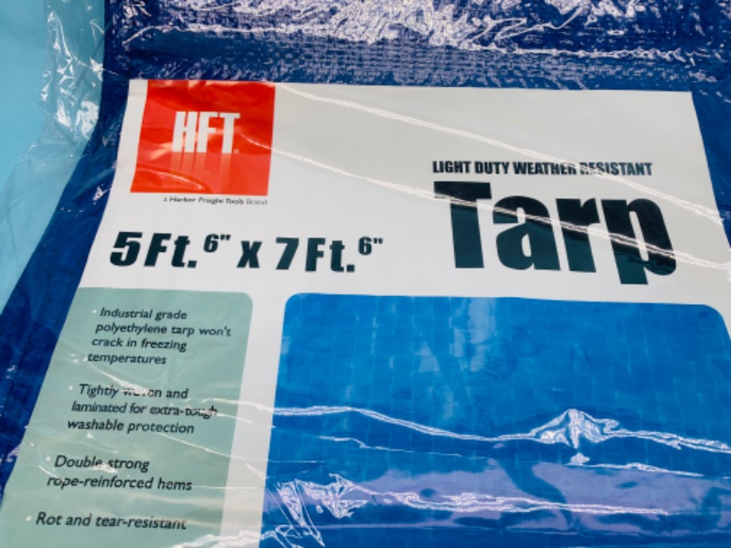 Photo 2 of 278701…two 5 x 7 foot tarps in packages 