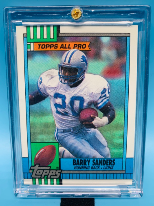 Photo 1 of 278707…topps Barry Sanders card 352 in hard plastic case 