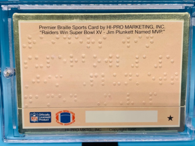 Photo 2 of 278711…Raiders Jim Plunkett braille sports card in hard plastic case 