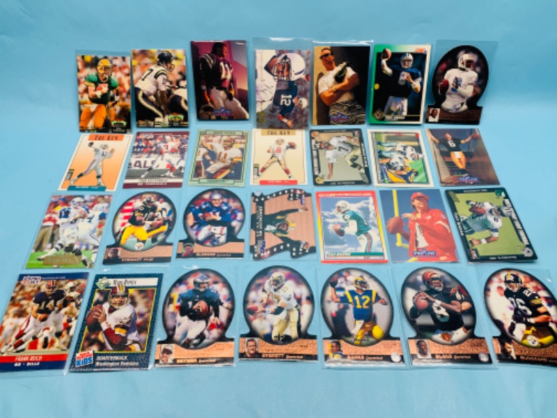 Photo 1 of 278723…28 nfl quarterback trading cards in plastic sleeves 