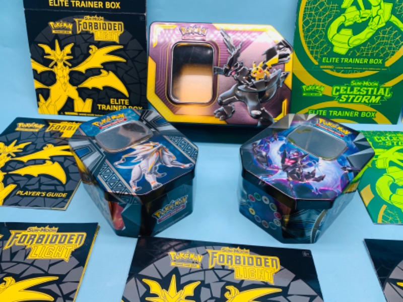 Photo 2 of 278733…empty Pokémon tins, players guides, and empty trainer boxes