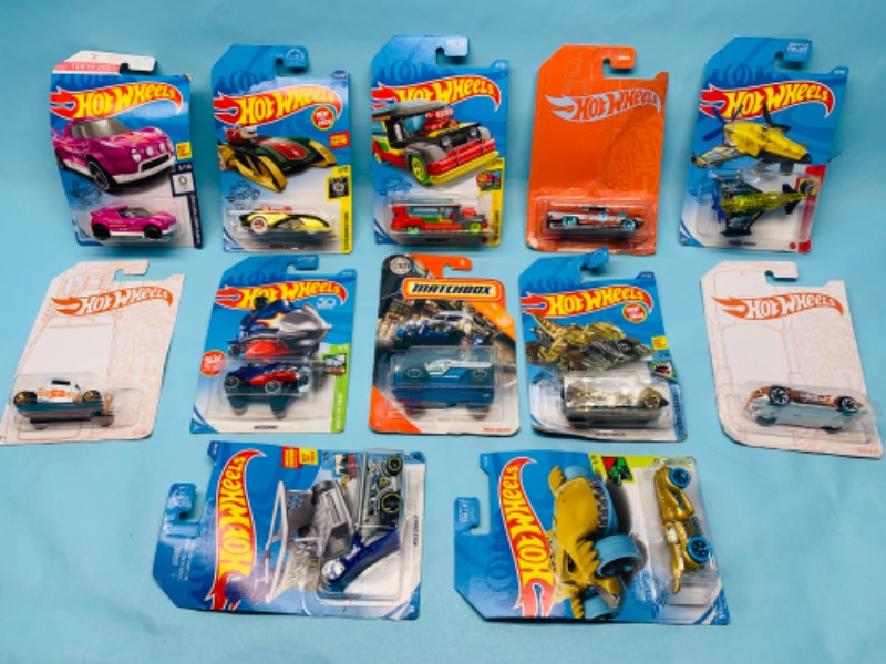 Photo 1 of 278752…12 bent packages of hot wheels die cast cars in original packages 