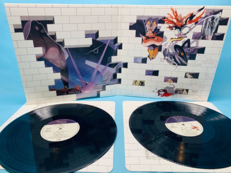 Photo 2 of 278763…great condition vinyl Pink Floyd The Wall remastered 2 record set  in plastic sleeve - cover and records in great condition 