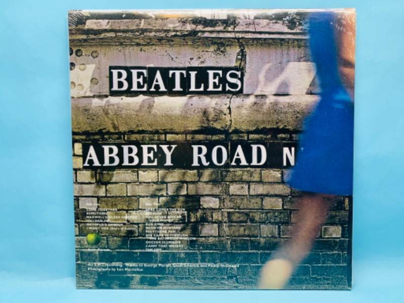 Photo 2 of 278764…sealed Beatles vinyl Abbey Road anniversary edition record in plastic sleeve 