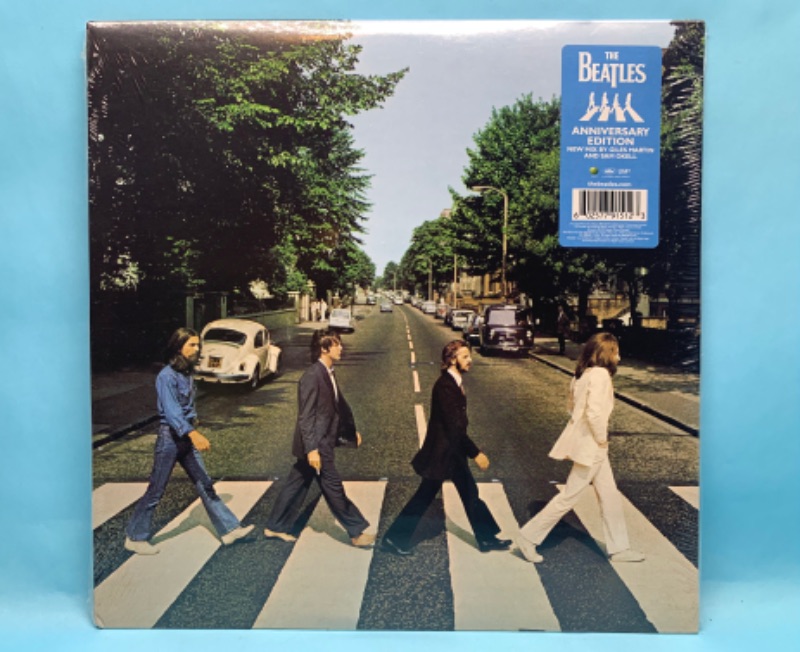 Photo 1 of 278764…sealed Beatles vinyl Abbey Road anniversary edition record in plastic sleeve 