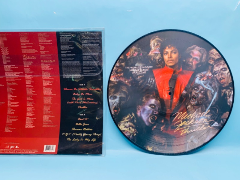 Photo 4 of 278765…great condition vinyl Michael Jackson Thriller picture disc record in plastic sleeve 2008