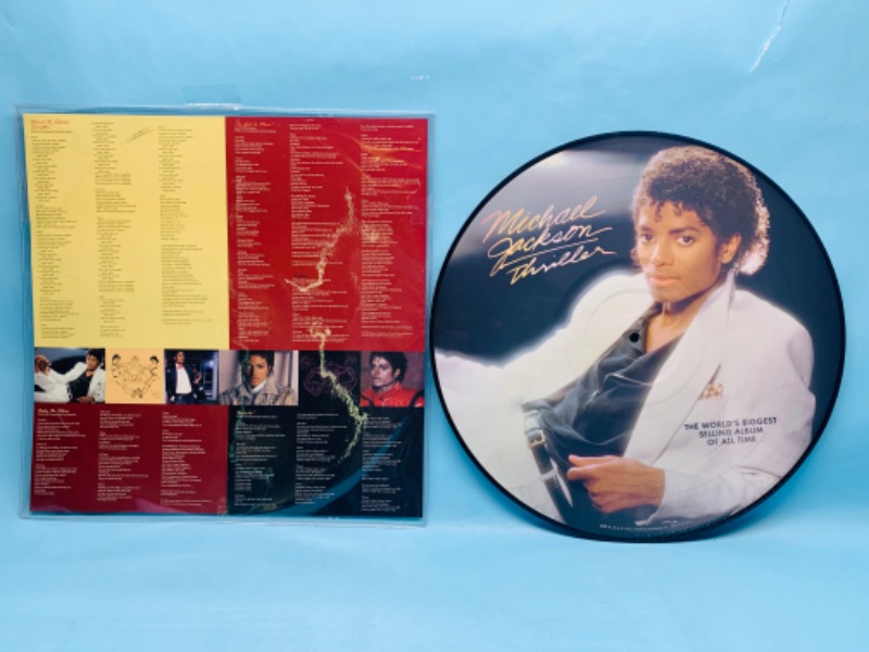 Photo 2 of 278765…great condition vinyl Michael Jackson Thriller picture disc record in plastic sleeve 2008