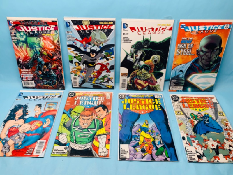 Photo 1 of 278769…8 justice league comics in plastic sleeves 
