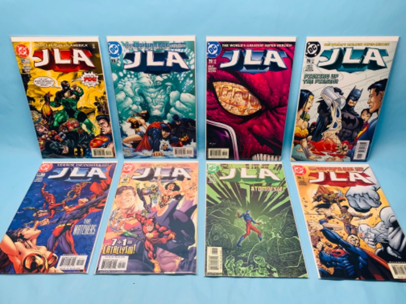 Photo 1 of 278770…8 JLA comics in plastic sleeves 