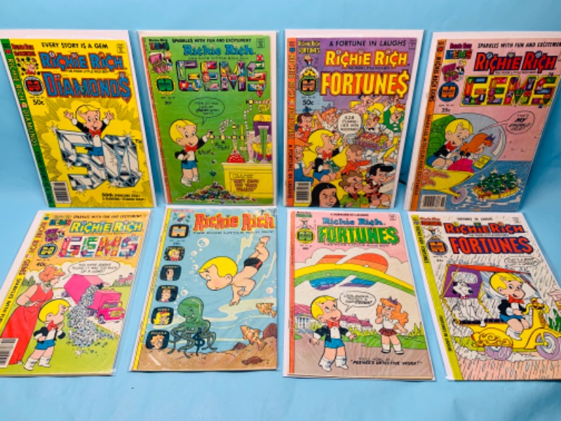 Photo 1 of 278787…8 vintage Richie Rich comics in plastic sleeves 