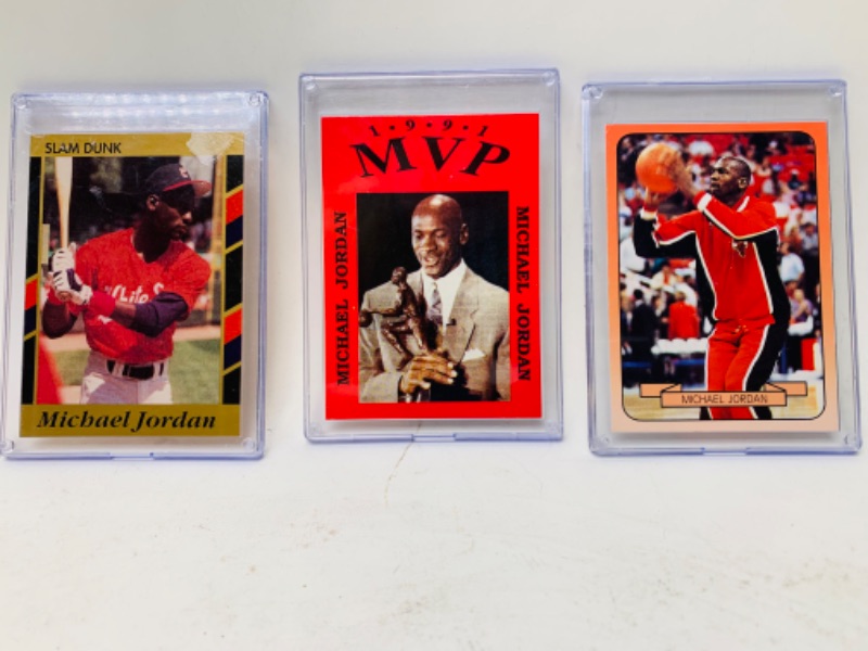 Photo 1 of 278868…3 Michael Jordan trading cards in plastic cases 