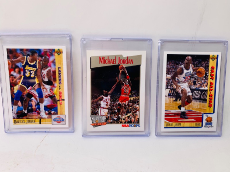 Photo 1 of 278870…3 Michael Jordan trading cards in plastic cases 