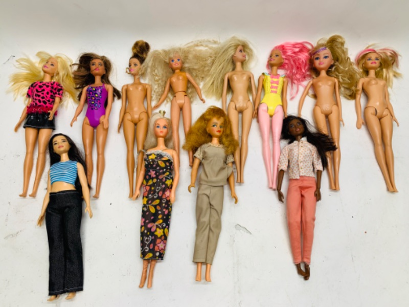 Photo 1 of 278884…12 vintage Barbie dolls- just needs a cleaning 