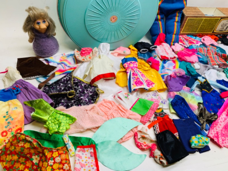 Photo 7 of 278886…vintage Barbie clothing and accessories, cabbage patch doll, and stereo console- needs a cleaning 