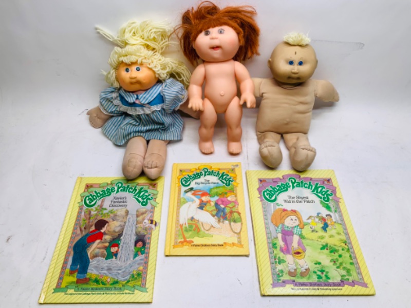 Photo 1 of 278902…3 vintage signed cabbage patch dolls and 3 books- needs cleaning- stains 