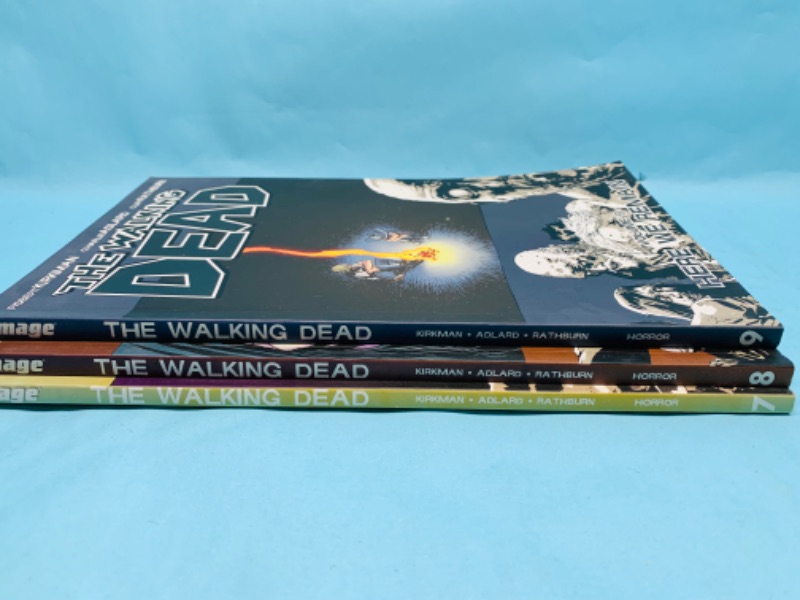 Photo 2 of 278907…3 walking dead paperback novels in plastic sleeves 