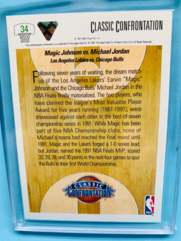 Photo 2 of 278930…upper deck classic confrontation Michael Jordan and Magic Johnson card 34 in hard plastic case 