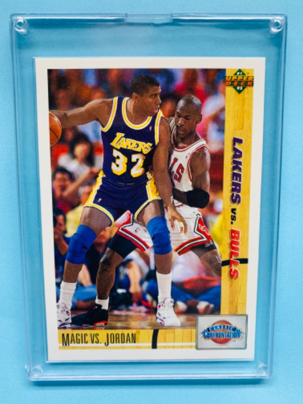 Photo 1 of 278930…upper deck classic confrontation Michael Jordan and Magic Johnson card 34 in hard plastic case 